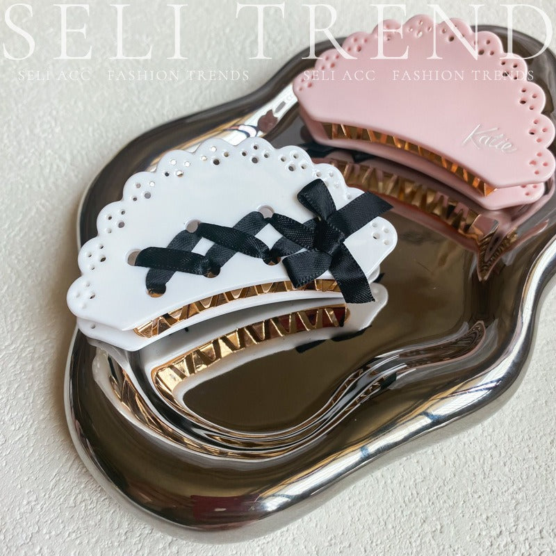 Wholesale Sweet and Cool Bow Hollow Letter Clip